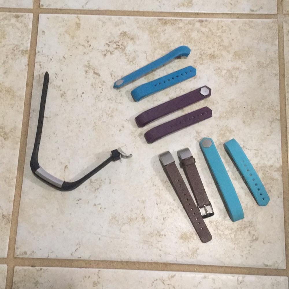Fitbit Alta size small with 4 extra bands.